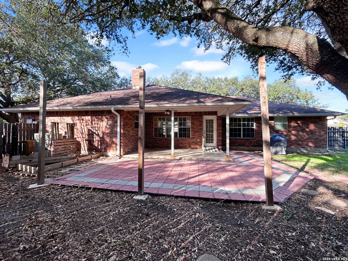607 Topaz Avenue Seguin, TX 78155 - Photo 22 of 23 a view of a house with backyard porch and sitting area