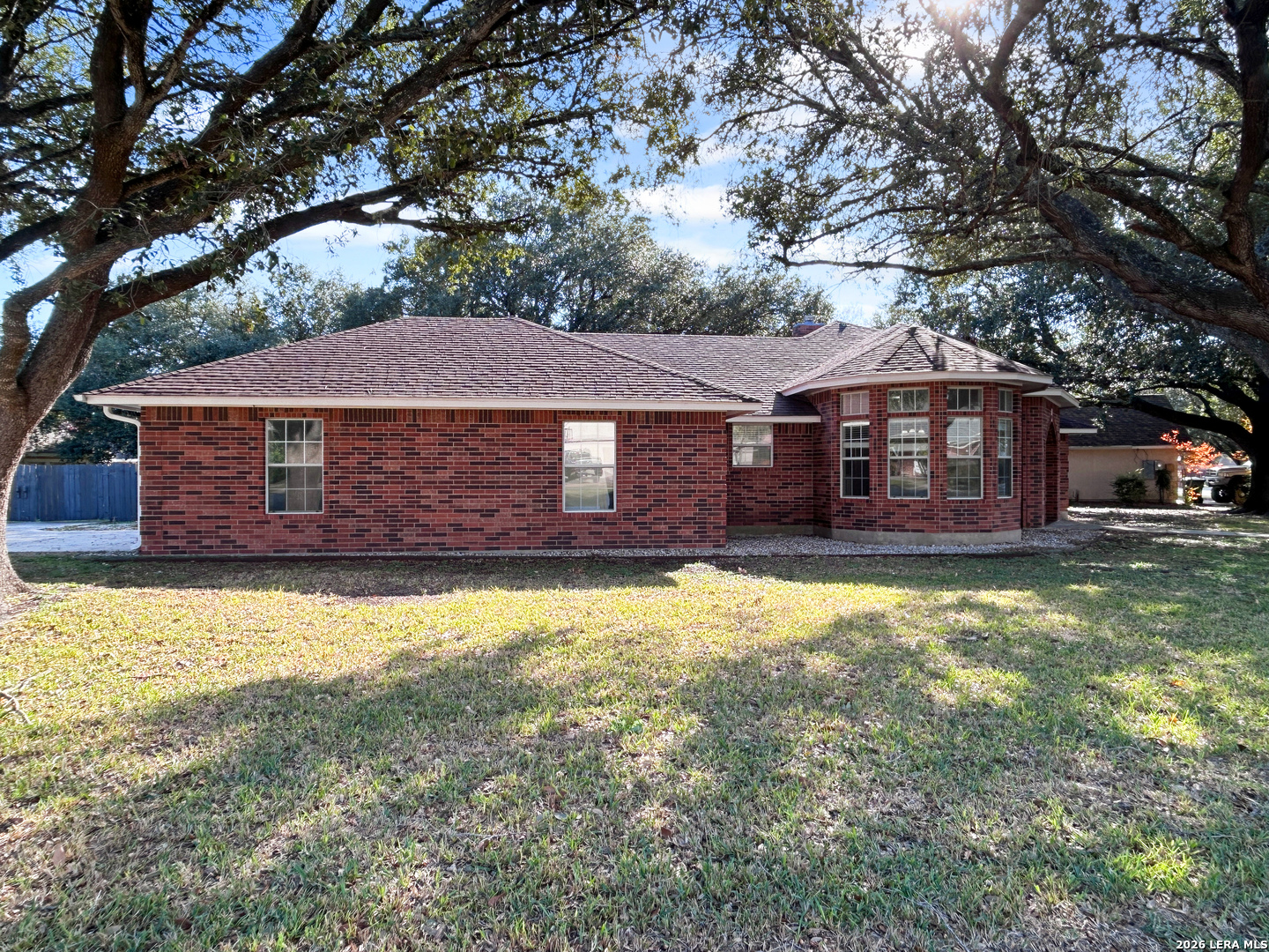 607 Topaz Avenue Seguin, TX 78155 - Photo 3 of 23 a front view of a house with a yard