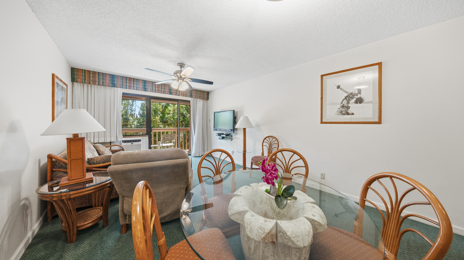 3411 Wilcox Road, Unit CV38 Lihue, HI 96766 - Photo 3 of 16 a living room with furniture a window and a chandelier