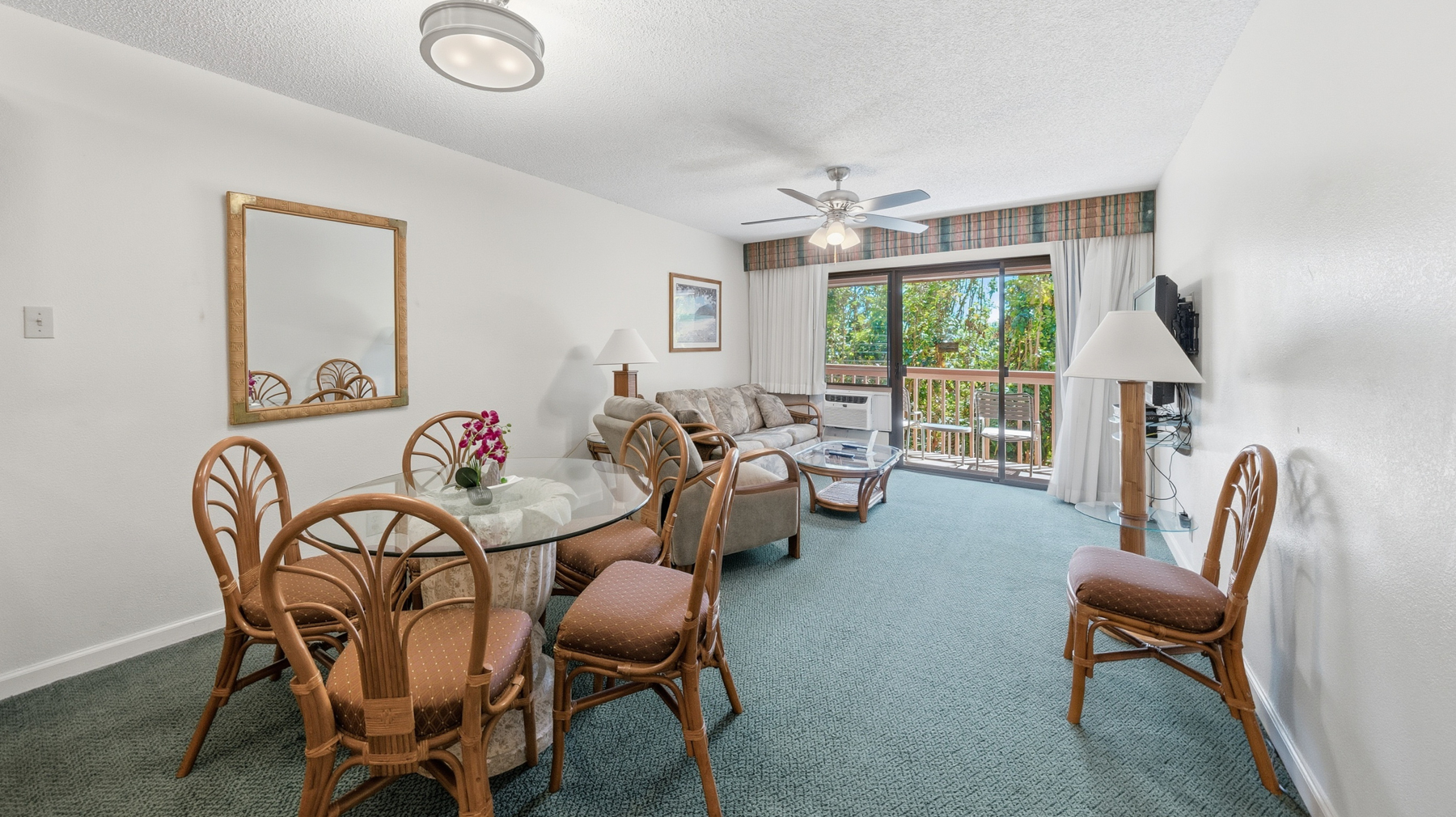 3411 Wilcox Road, Unit CV38 Lihue, HI 96766 - Photo 7 of 16 a view of a livingroom and a dining room with furniture window and outside view