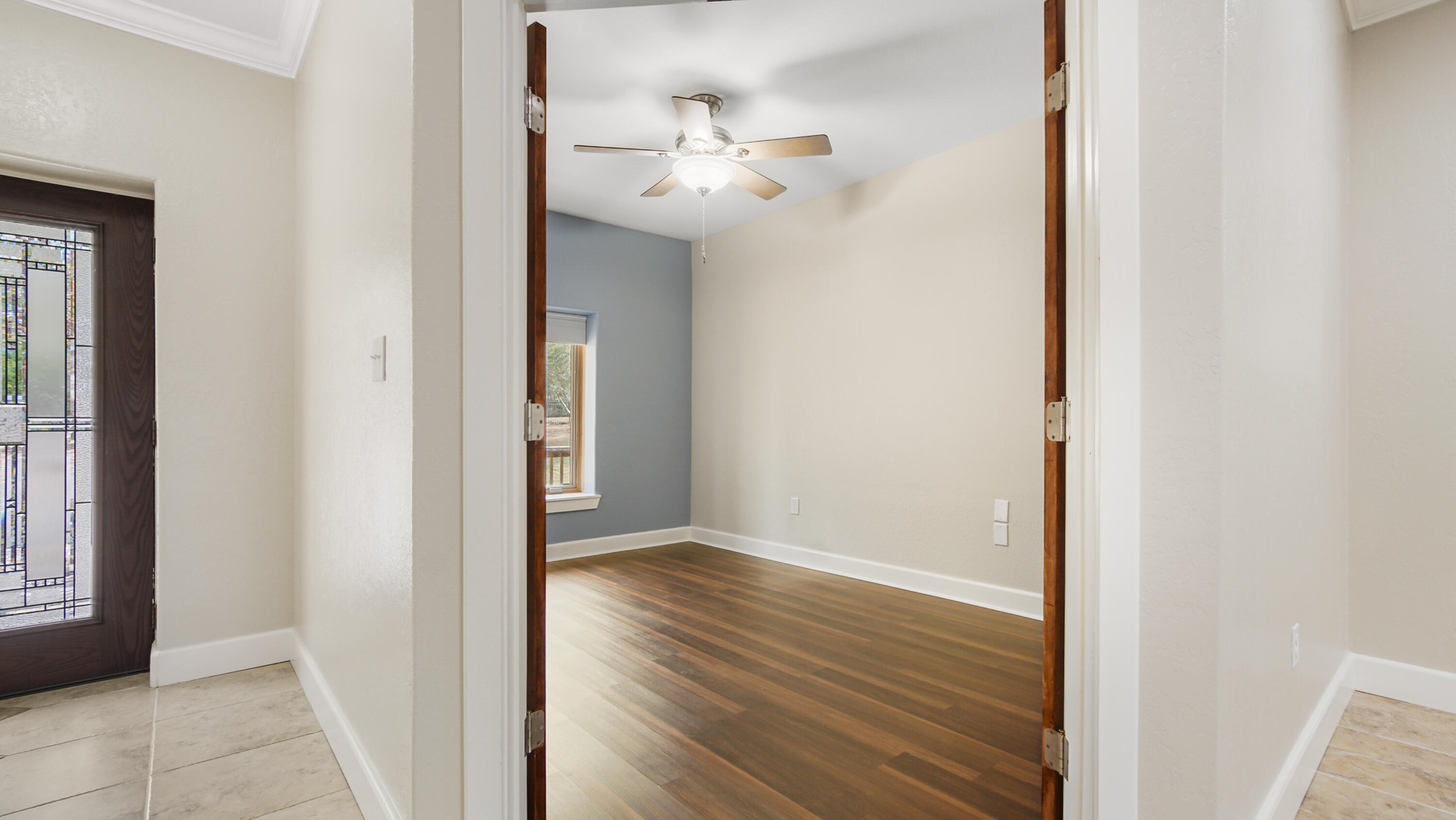 2060 Spring Lake Road DeFuniak Springs, FL 32433 - Photo 12 of 80 a view of a hallway with wooden floor