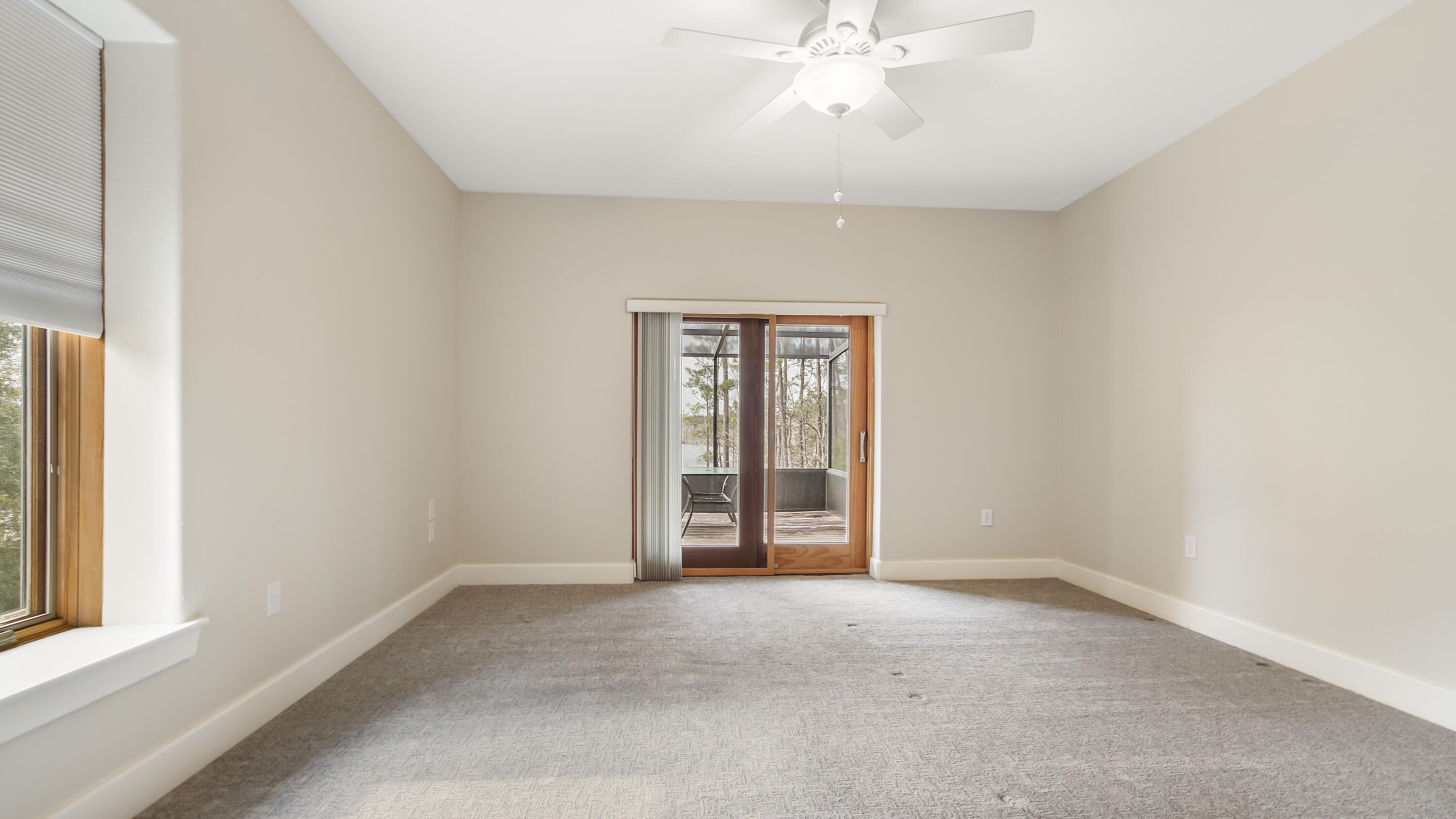 2060 Spring Lake Road DeFuniak Springs, FL 32433 - Photo 38 of 80 an empty room with chandelier fan