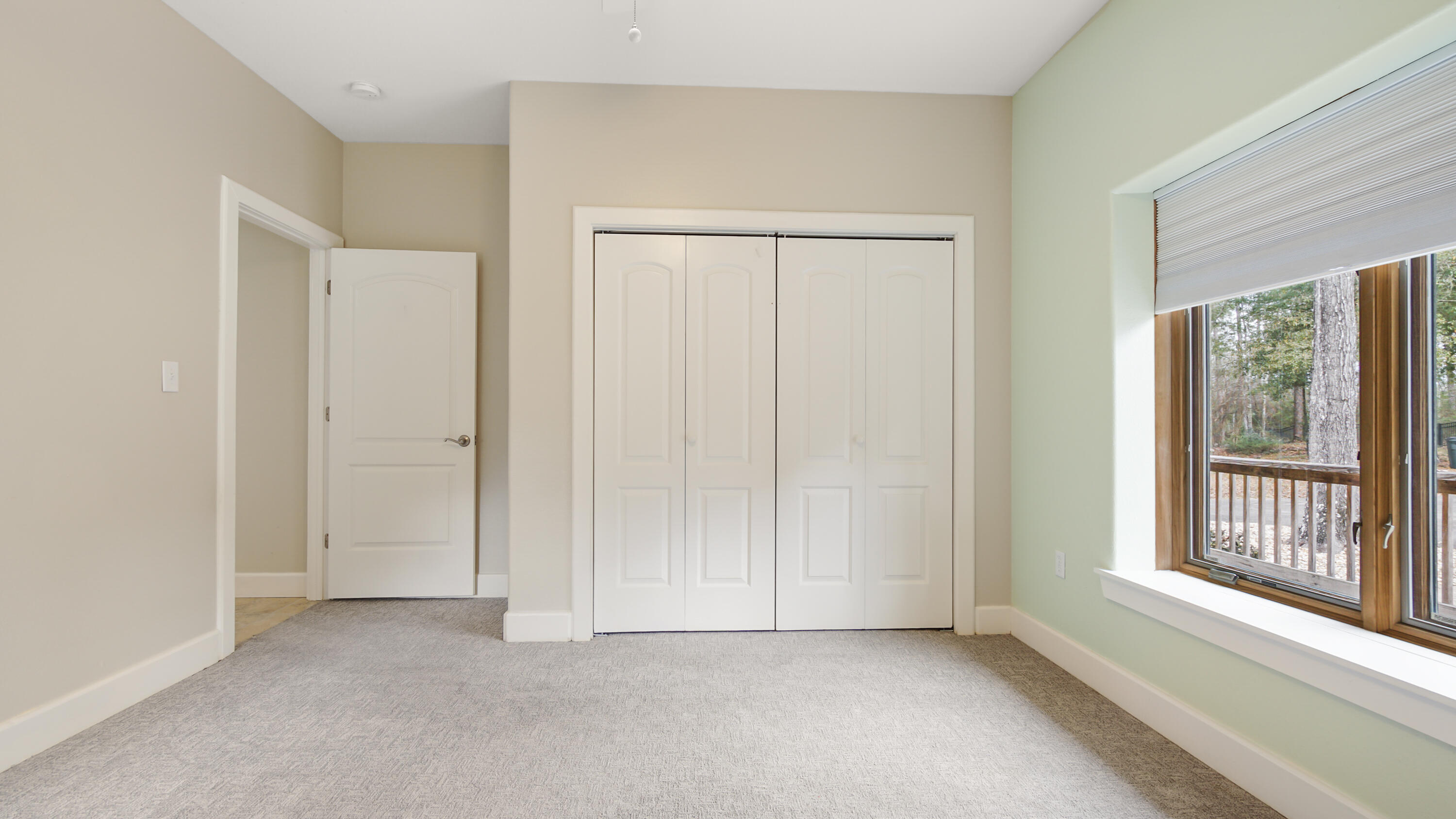 2060 Spring Lake Road DeFuniak Springs, FL 32433 - Photo 47 of 80 a view of an empty room with windows & cabinet