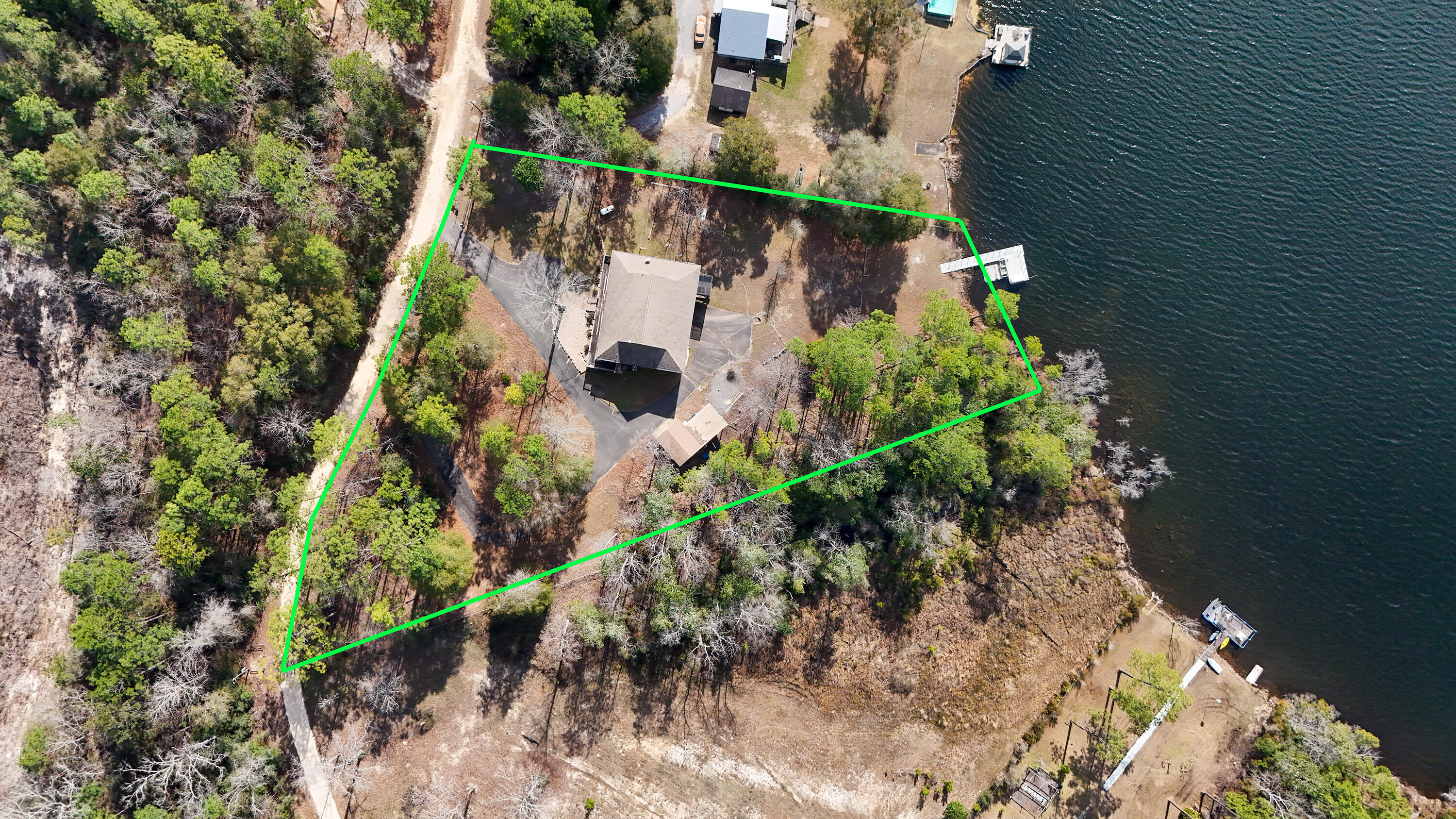 2060 Spring Lake Road DeFuniak Springs, FL 32433 - Photo 5 of 80 an aerial view of residential house with outdoor space