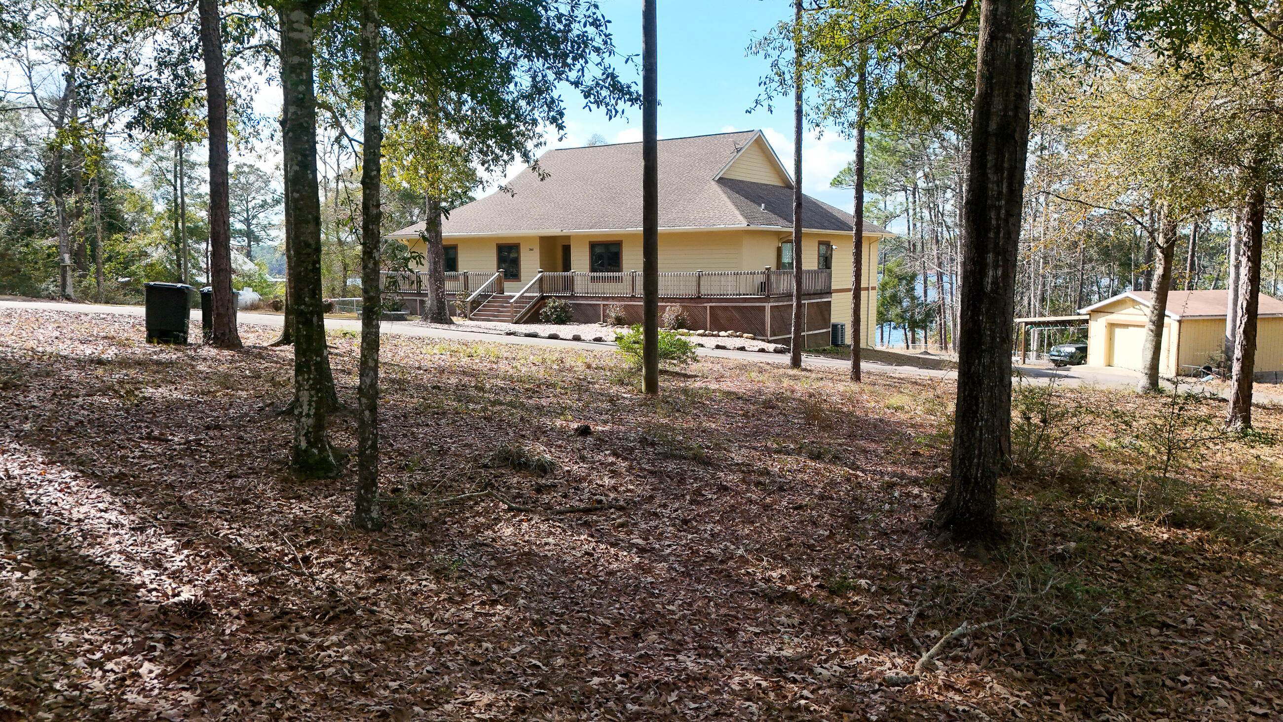 2060 Spring Lake Road DeFuniak Springs, FL 32433 - Photo 68 of 80 a backyard of a house with lots of green space