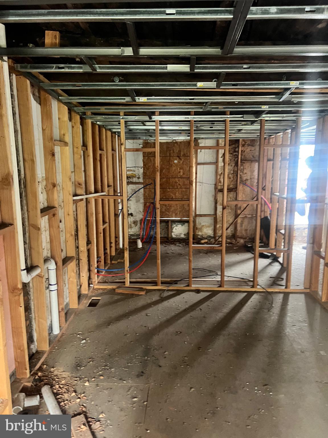 2413 Grays Ferry Avenue Philadelphia, PA 19146 - Photo 12 of 16 a view of an empty room with wooden floor