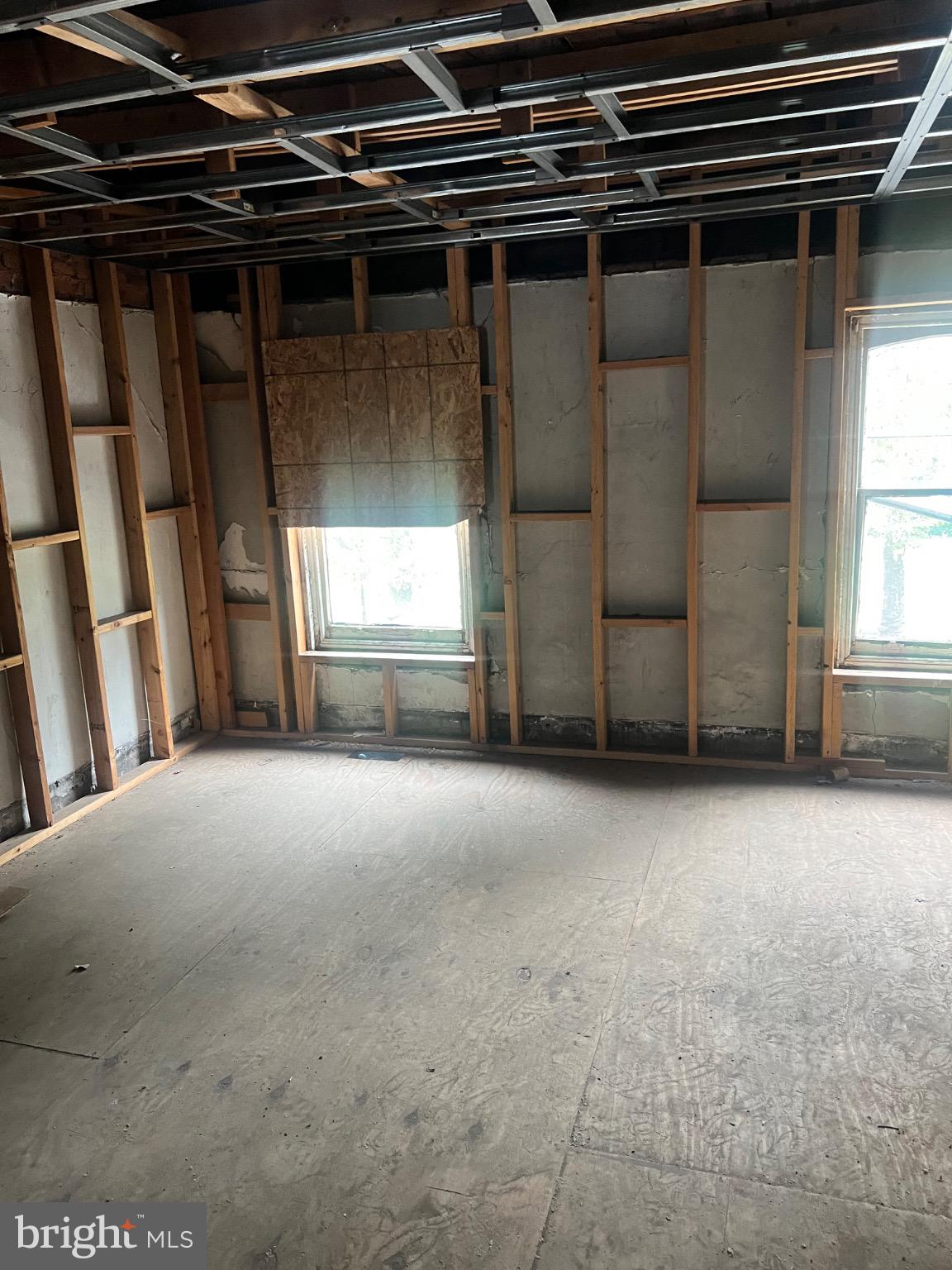 2413 Grays Ferry Avenue Philadelphia, PA 19146 - Photo 16 of 16 a view of empty room with wooden floor and fan