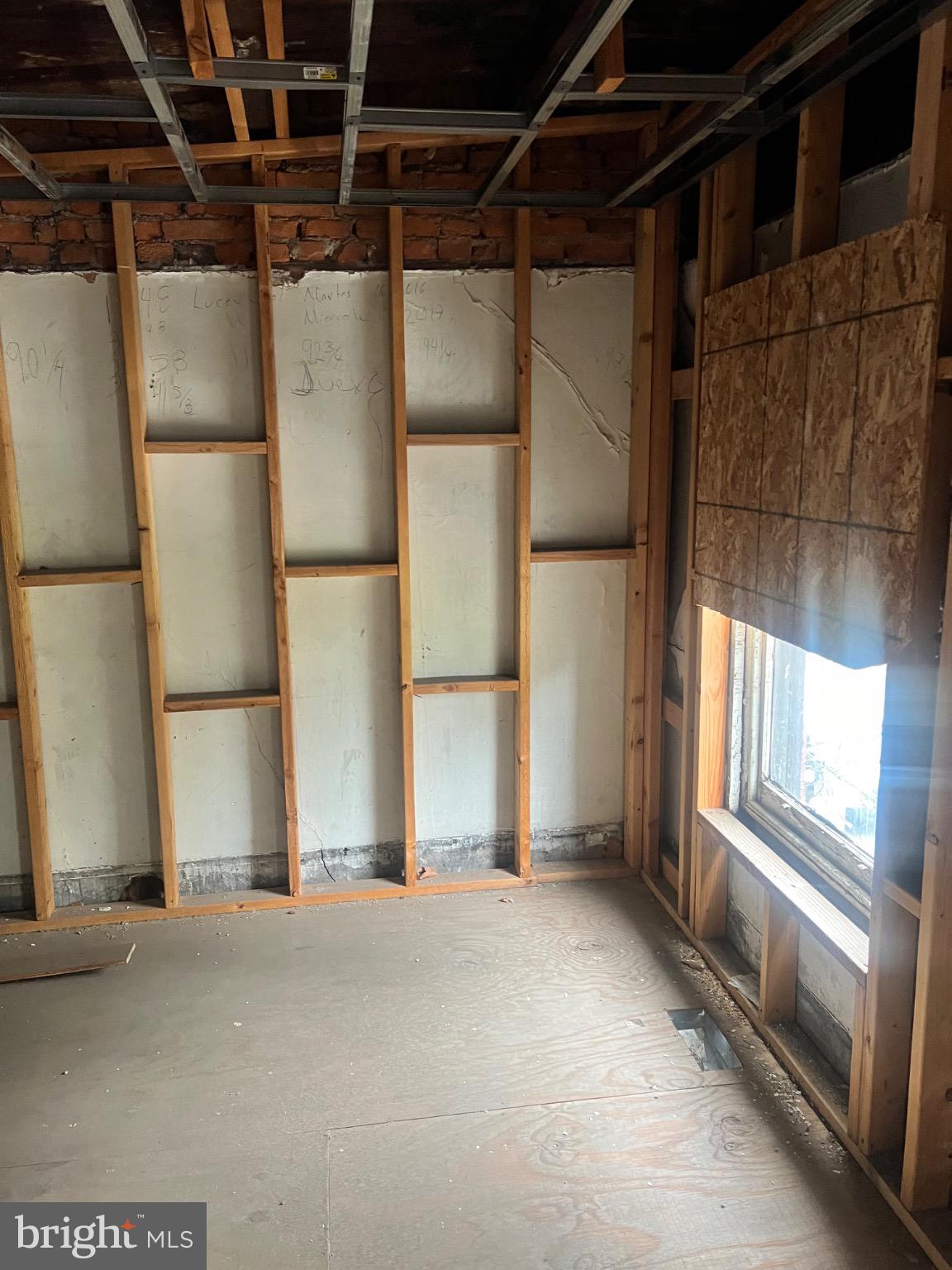 2413 Grays Ferry Avenue Philadelphia, PA 19146 - Photo 10 of 16 a view of an empty room with a window