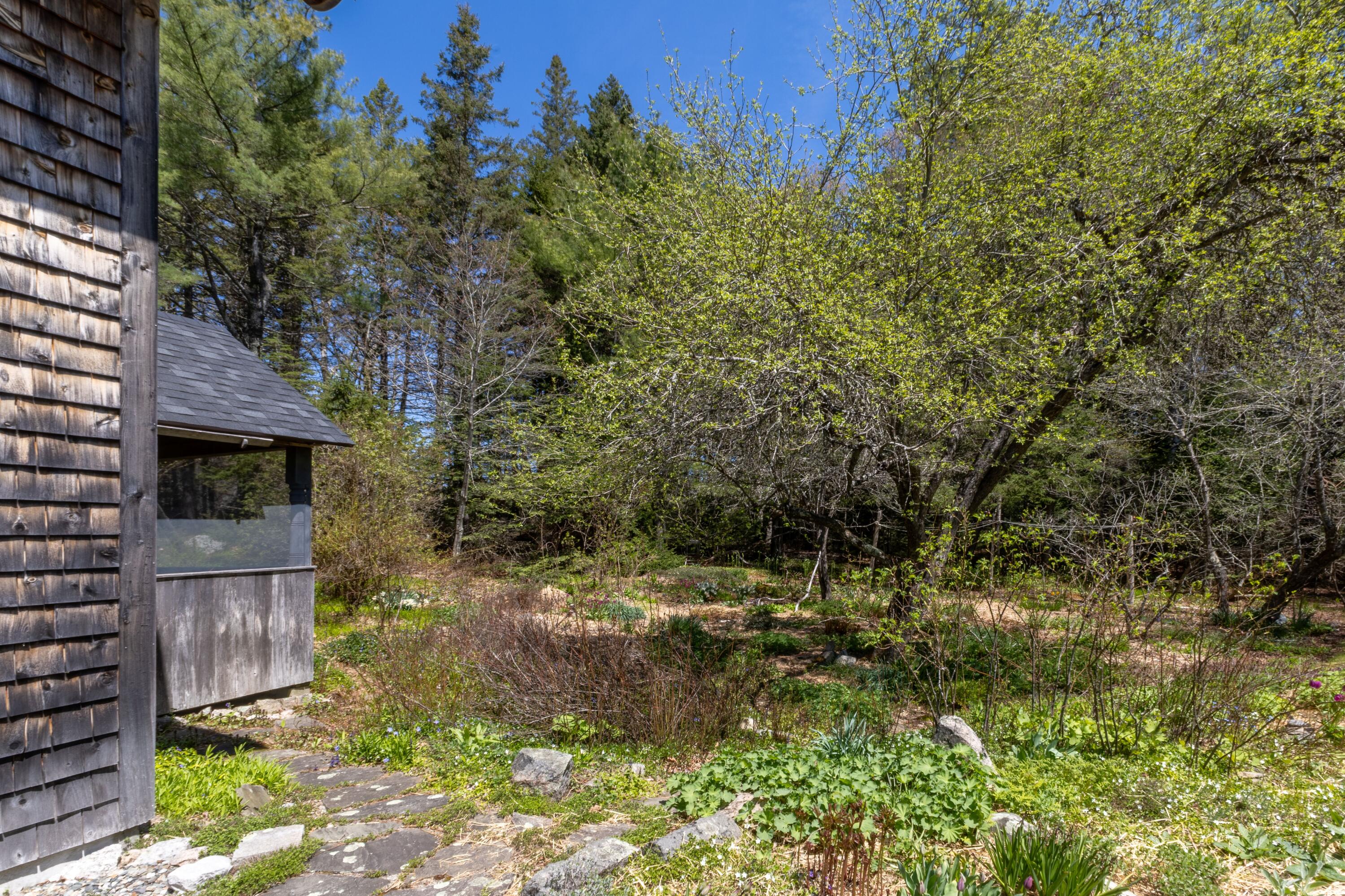 12 Bakers Point Road Steuben, ME 04680 - Photo 70 of 86 Screened porch w/view to apple tree.