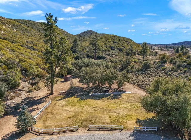 a kitchen with a stove a refrigerator and a sink