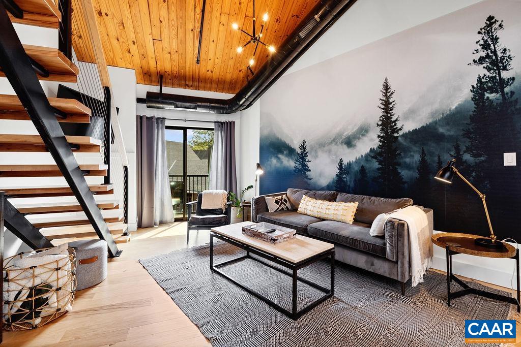 a outdoor living space with furniture and a fireplace