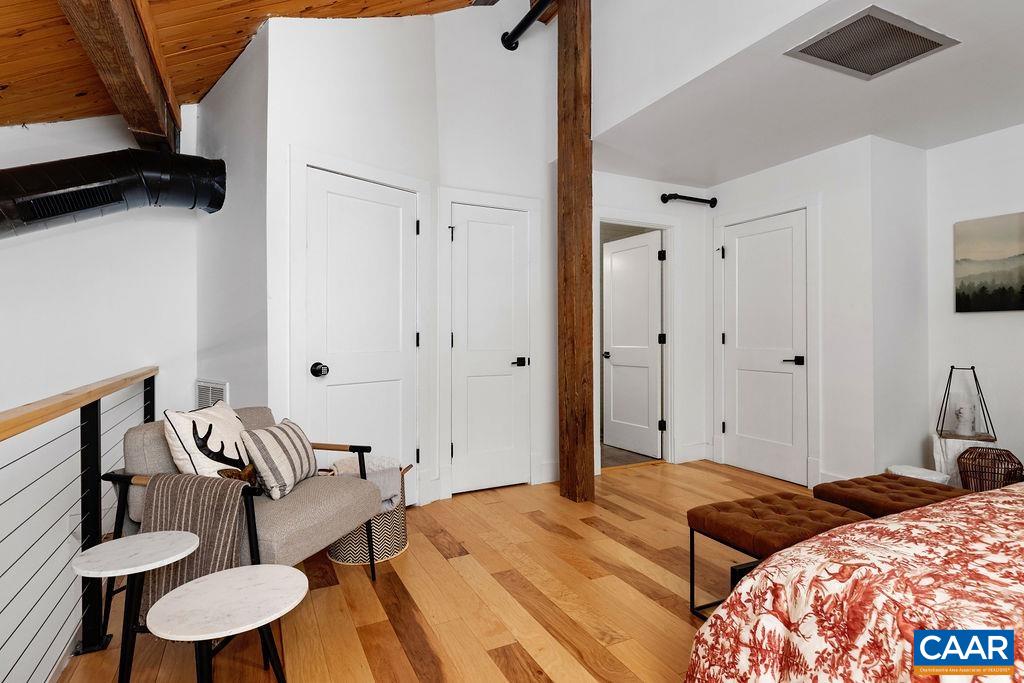 163 Mountain Inn Loop Roseland, VA 22967 - Photo 13 of 24 a bedroom with bed and a furniture