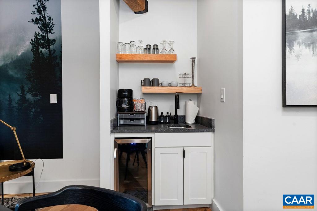 163 Mountain Inn Loop Roseland, VA 22967 - Photo 6 of 24 a kitchen with a sink a stove and cabinets