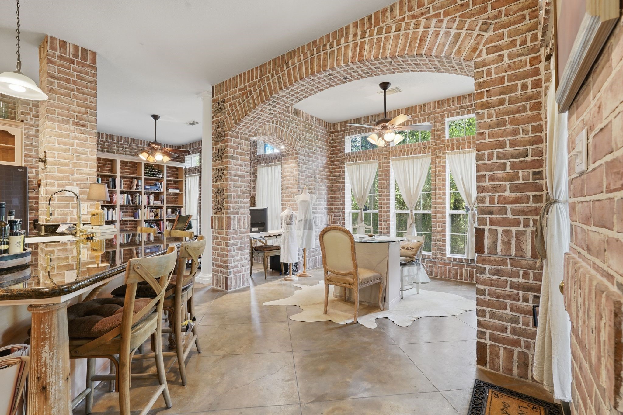 25014 Northampton Terrace Drive Spring, TX 77389 - Photo 11 of 50 The masonary inside the home brings an English cottage charm. The details in the laying of the brick is art worthy