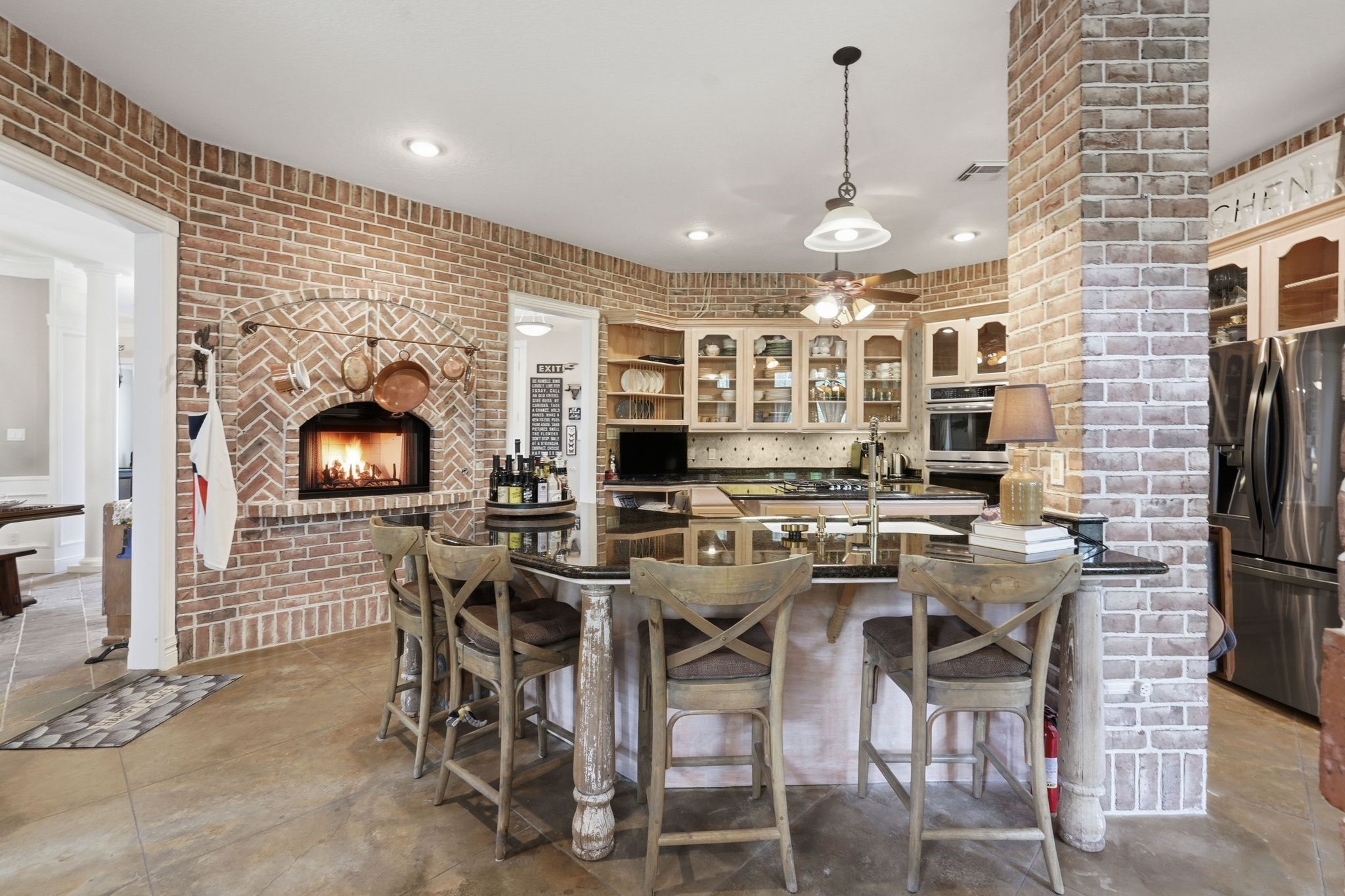 25014 Northampton Terrace Drive Spring, TX 77389 - Photo 14 of 50 Plenty of space for bar chairs around the kitchen counter