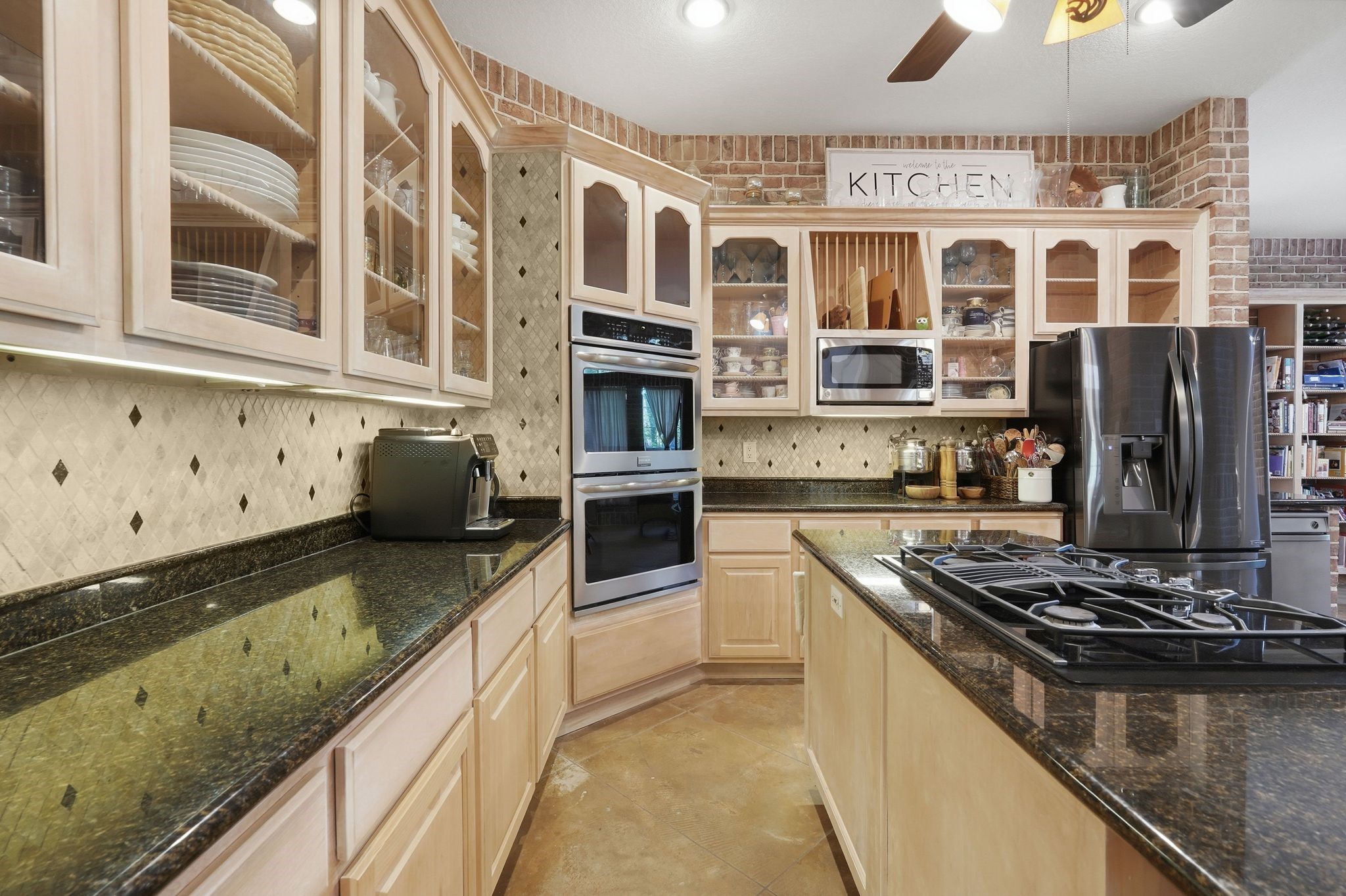 25014 Northampton Terrace Drive Spring, TX 77389 - Photo 16 of 50 4 burner gas stovetop with downdraft venting, double ovens and microwave