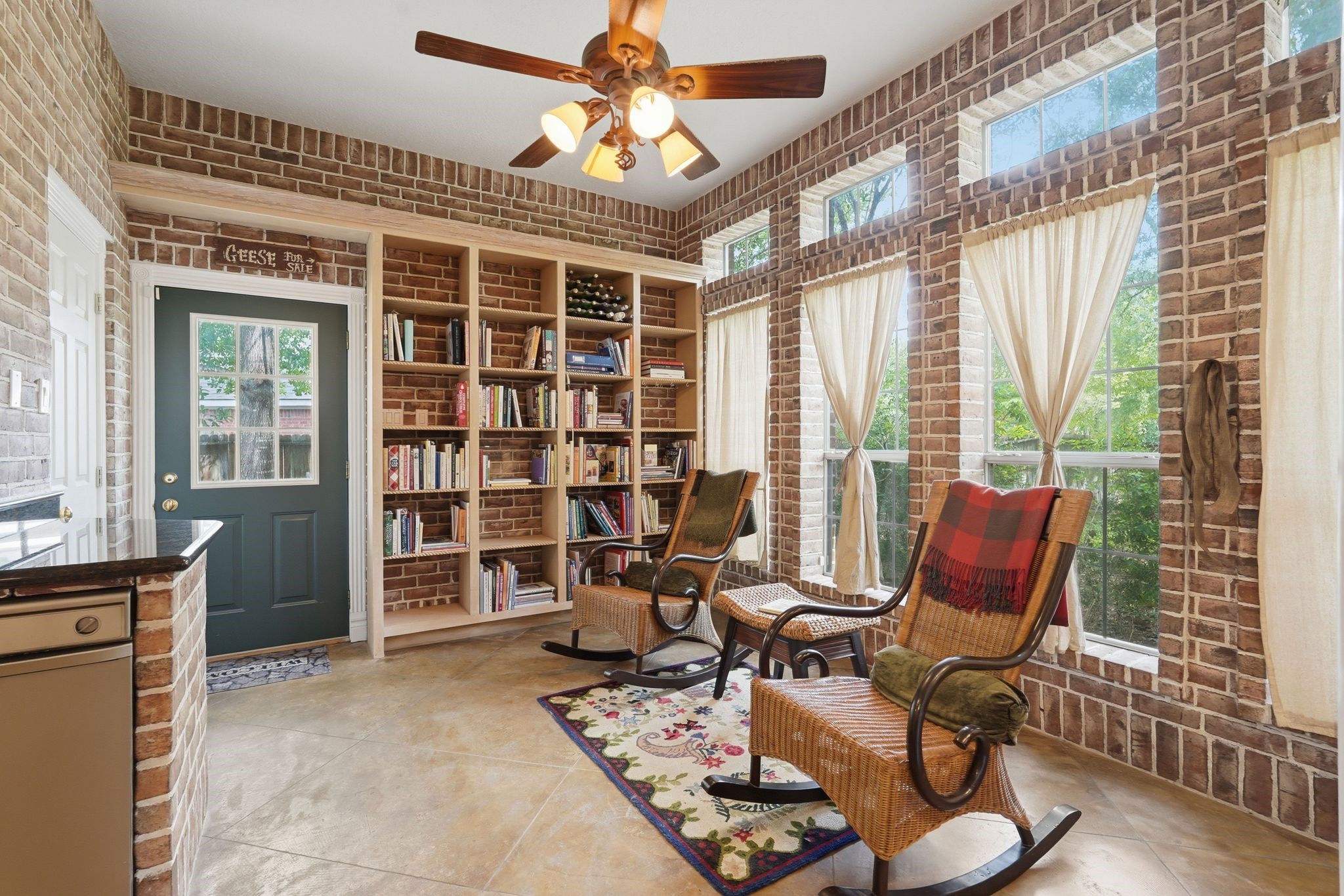 25014 Northampton Terrace Drive Spring, TX 77389 - Photo 20 of 50 This sitting area can be a second breakfast room, a reading room or just a place to hang out! Another wall of shelving for your favorite cookbooks or novels.