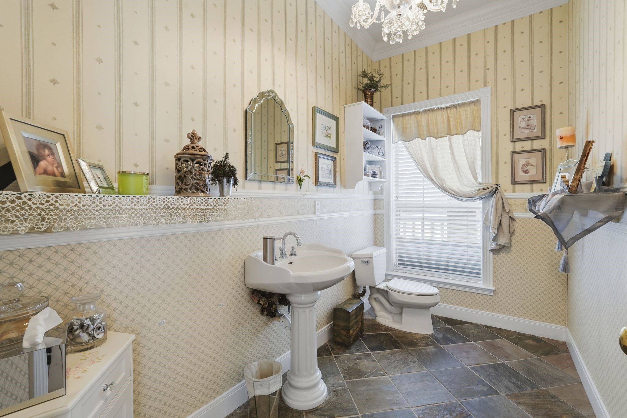 25014 Northampton Terrace Drive Spring, TX 77389 - Photo 22 of 50 There is a half bath convenient to the side entrance into the home and close to the kitchen.