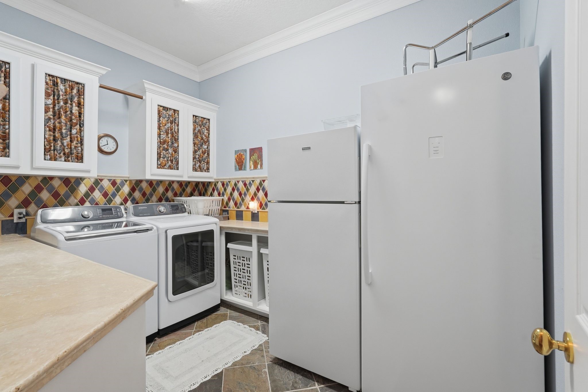 25014 Northampton Terrace Drive Spring, TX 77389 - Photo 28 of 50 Laundry room is located on the first floor with plenty of space for an extra refrigerator and freezer.