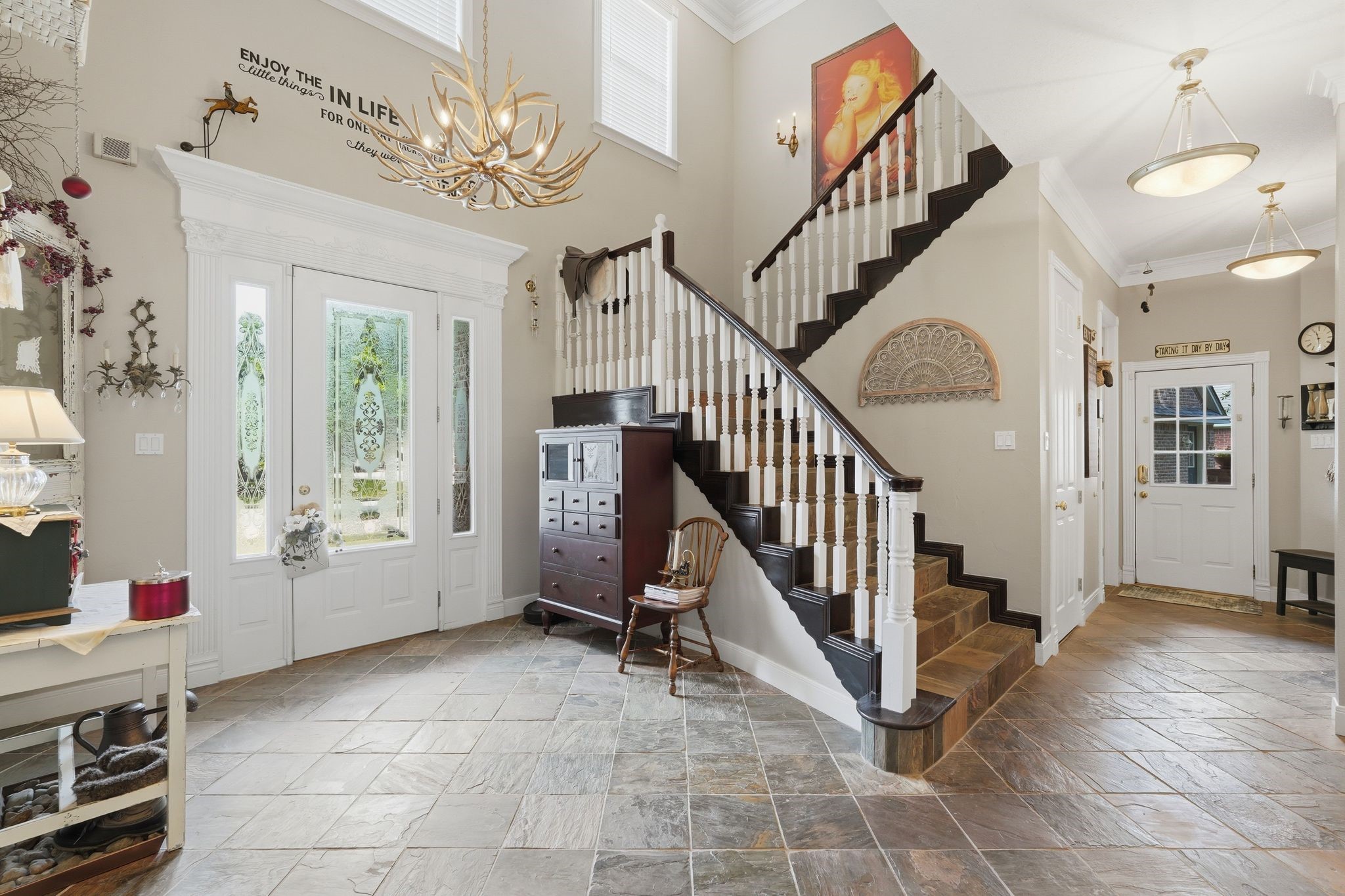 25014 Northampton Terrace Drive Spring, TX 77389 - Photo 7 of 50 The spacious foyer with lots of natural light from the beautifully etched glass front door. Dramatic high ceilings