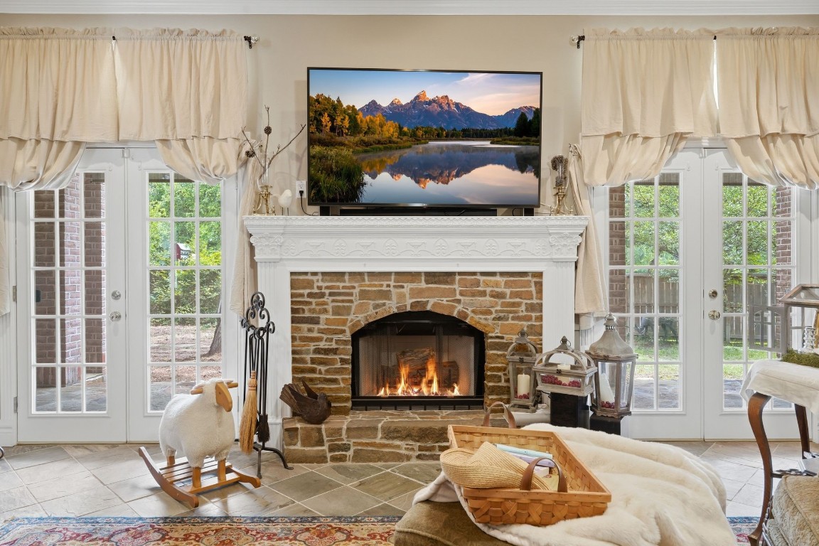 25014 Northampton Terrace Drive Spring, TX 77389 - Photo 9 of 50 The family room with wood burning fireplace, stone hearth and elegant mantle makes for a cozy night at home