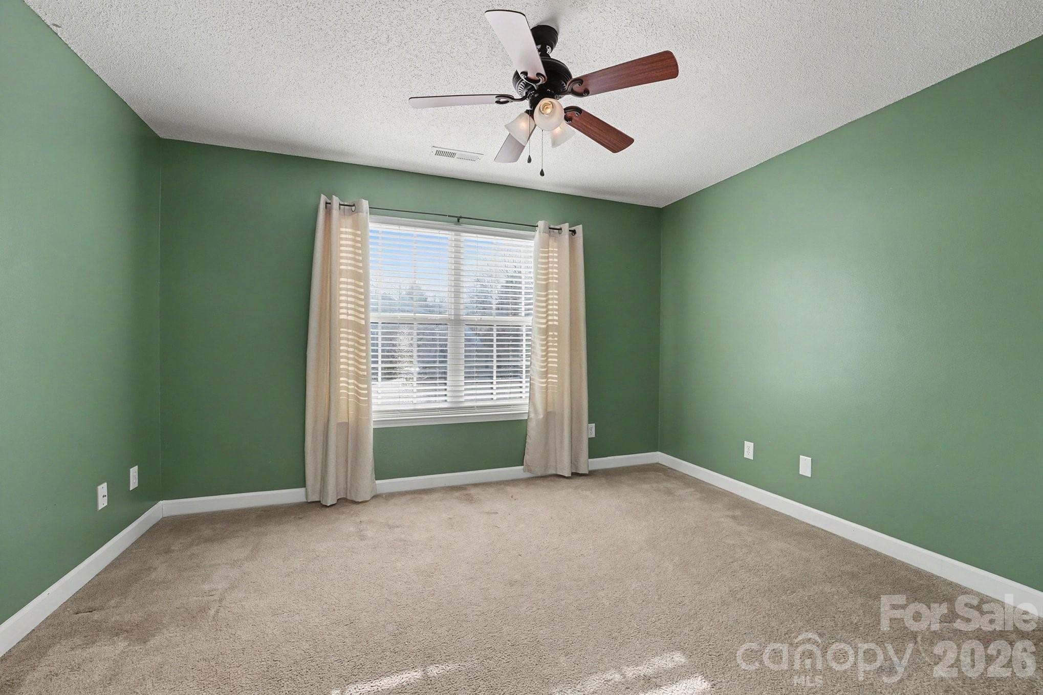 534 Canopy Court Clover, SC 29710 - Photo 14 of 19 a view of room with window and ceiling fan