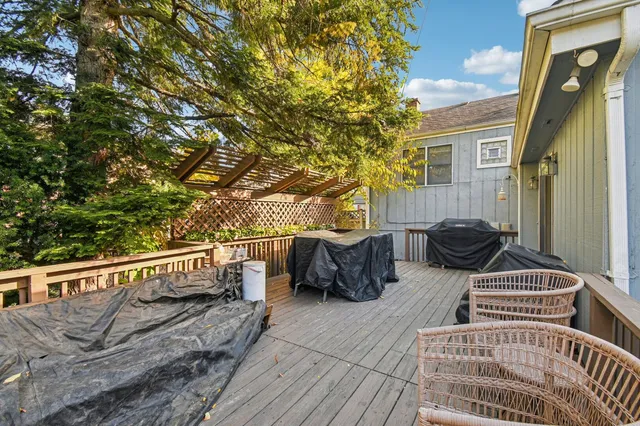 a view of balcony with furniture