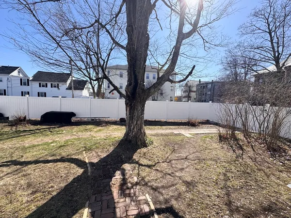 a view of back yard of the house
