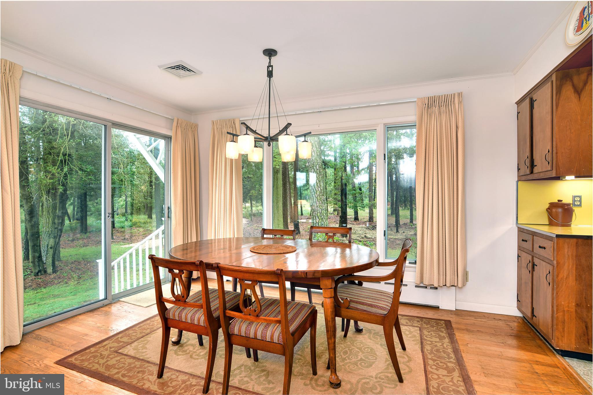 1015 Ross Thumb Road Cambridge, MD 21613 - Photo 14 of 64 Dining Room with View towards the Gardens and Wate