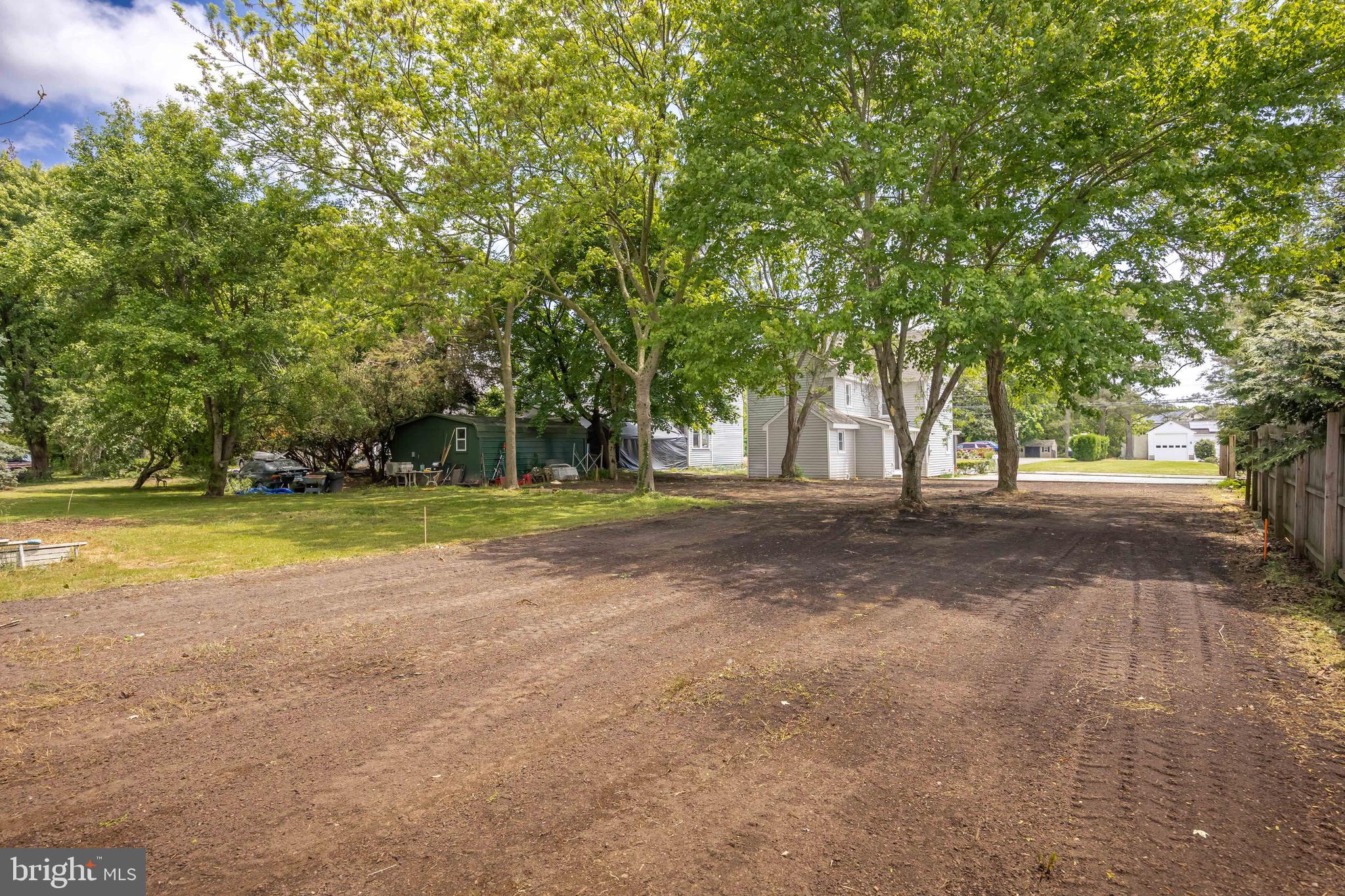 8359 Newark Road Newark, MD 21841 - Photo 50 of 53 a view of a house with a big yard and large trees