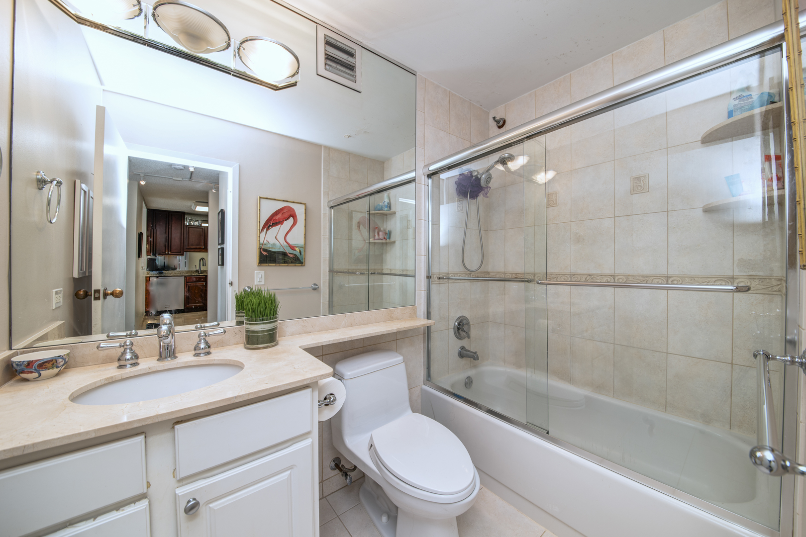 33 West Delaware Place, Unit 19H Chicago, IL 60610 - Photo 11 of 17 a bathroom with a sink a toilet and shower