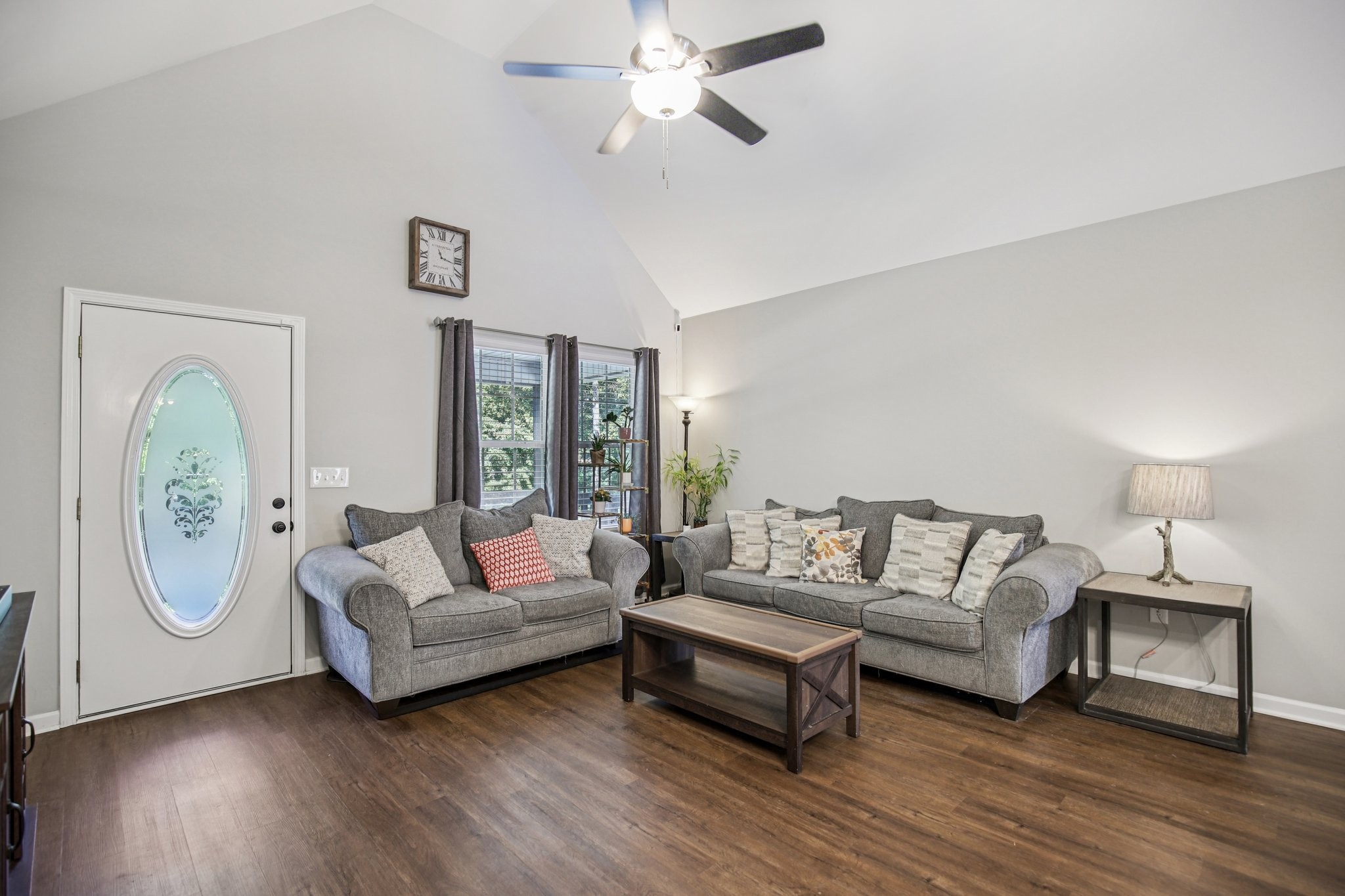 1122 Taylortown Road White Bluff, TN 37187 - Photo 11 of 56 a living room with furniture a lamp and a large window