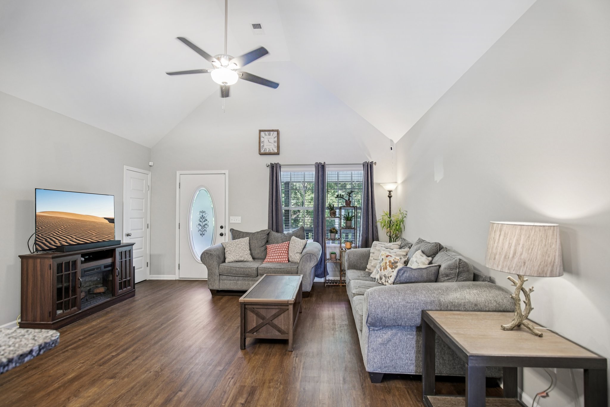 1122 Taylortown Road White Bluff, TN 37187 - Photo 12 of 56 a living room with furniture fireplace and a flat screen tv