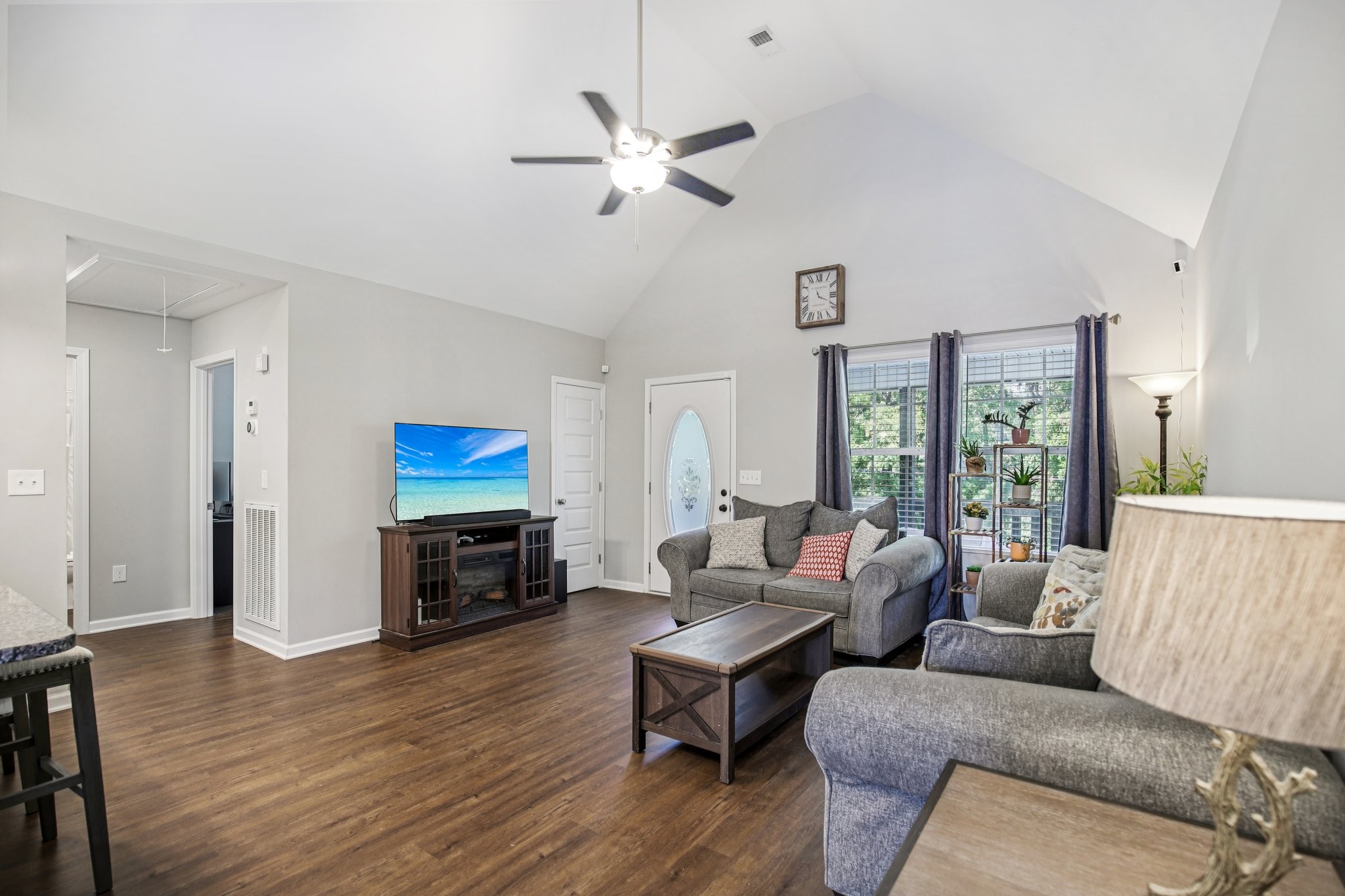 1122 Taylortown Road White Bluff, TN 37187 - Photo 14 of 56 a living room with furniture a fireplace and a flat screen tv