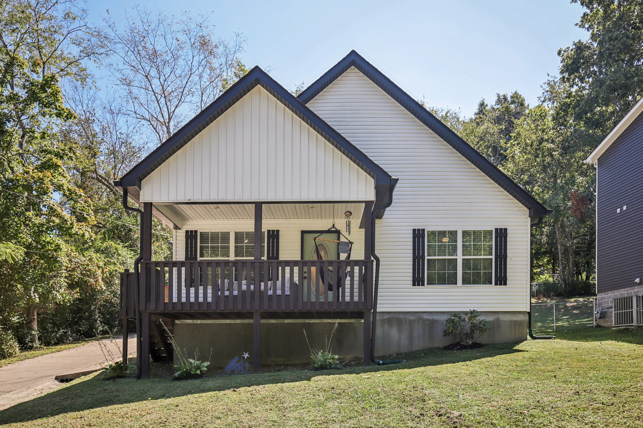 1122 Taylortown Road White Bluff, TN 37187 - Photo 2 of 56 a view of a house with wooden deck and a yard