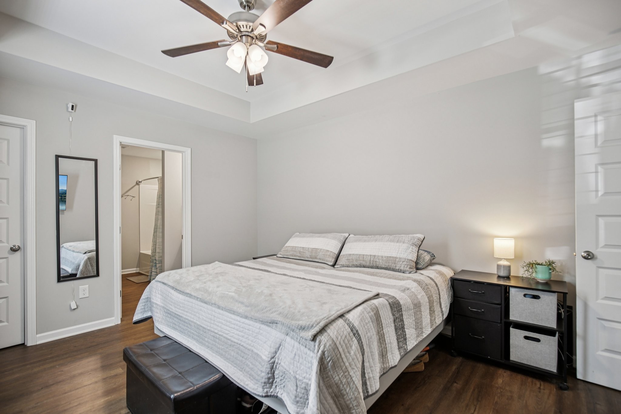 1122 Taylortown Road White Bluff, TN 37187 - Photo 37 of 56 a bedroom with a bed and wooden floor