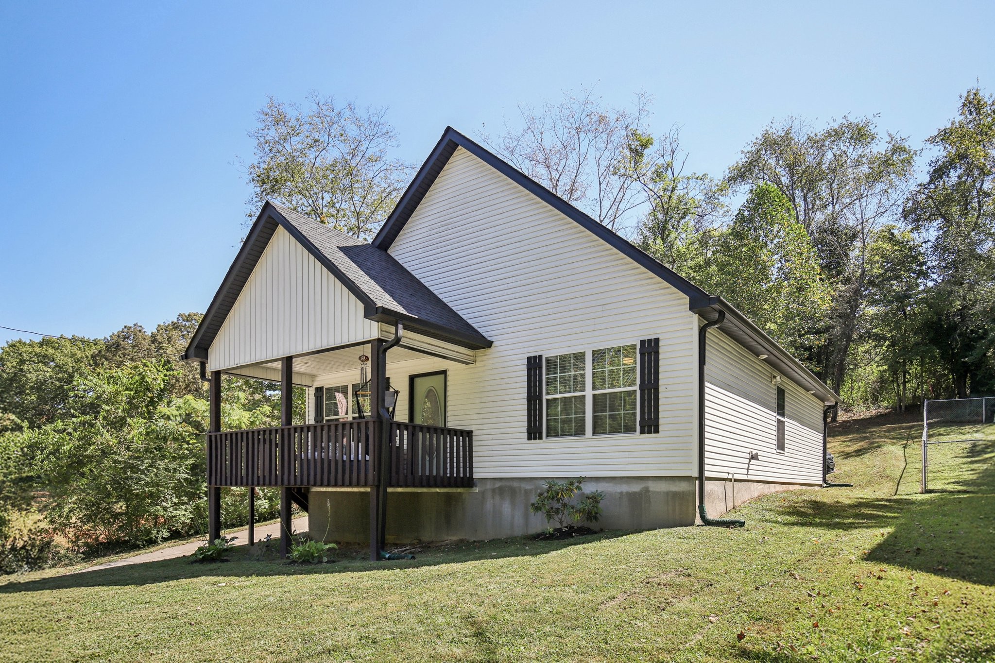 1122 Taylortown Road White Bluff, TN 37187 - Photo 4 of 56 a front view of a house with garden