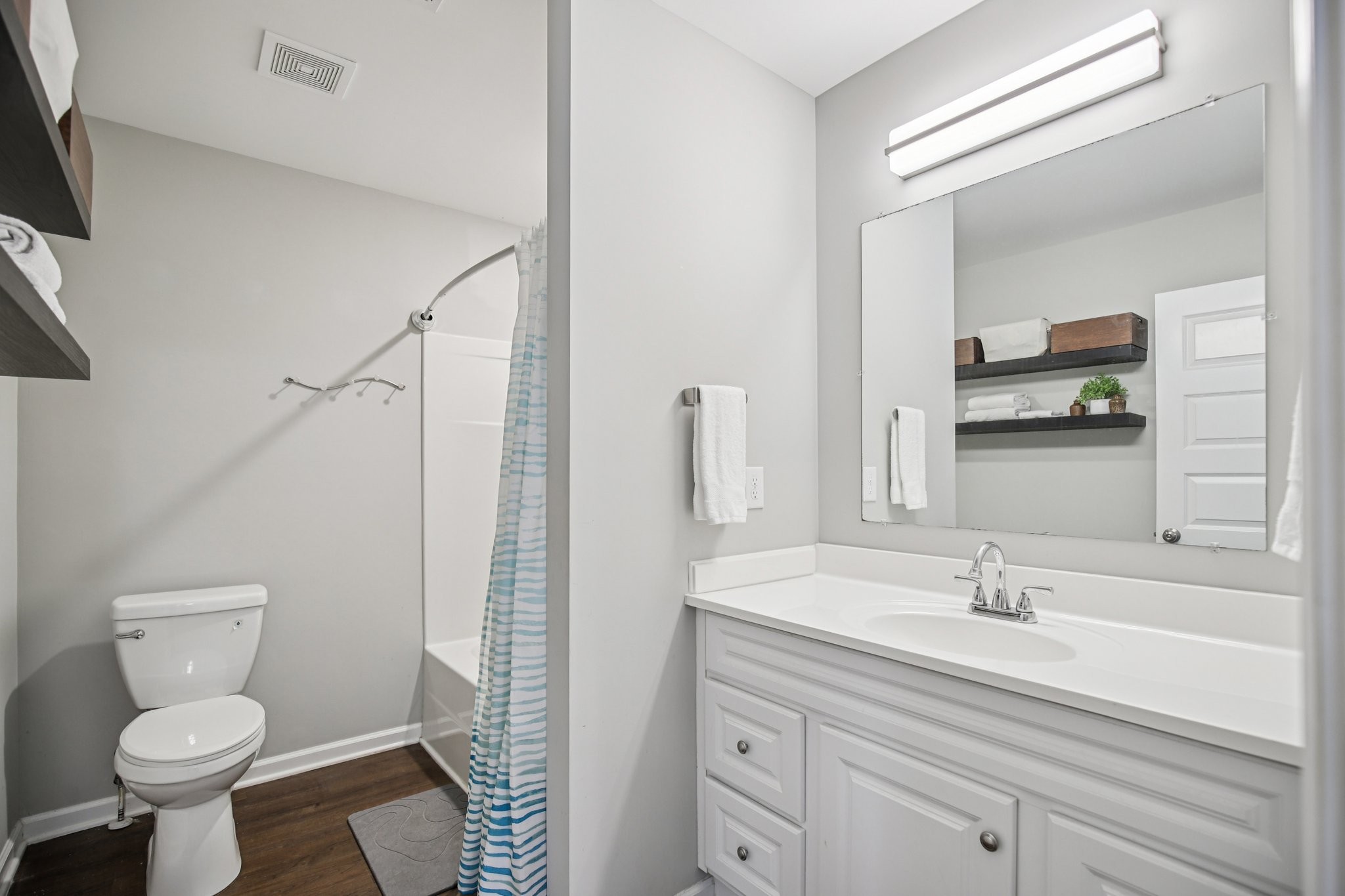 1122 Taylortown Road White Bluff, TN 37187 - Photo 41 of 56 a bathroom with a sink a toilet and shower