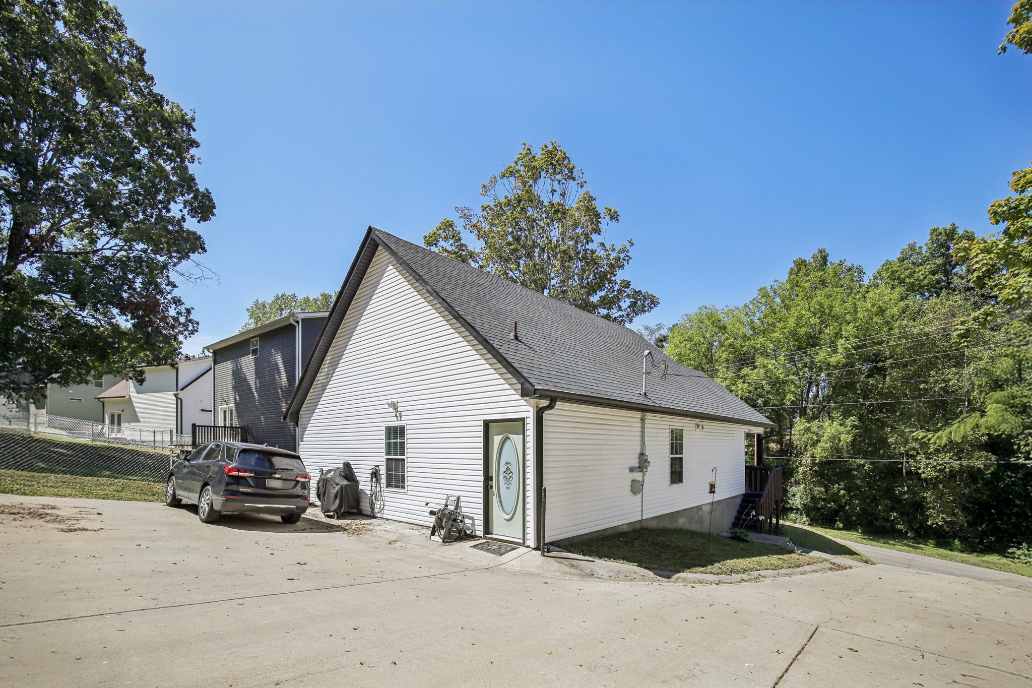 1122 Taylortown Road White Bluff, TN 37187 - Photo 48 of 56 a view of a house with a yard and garage
