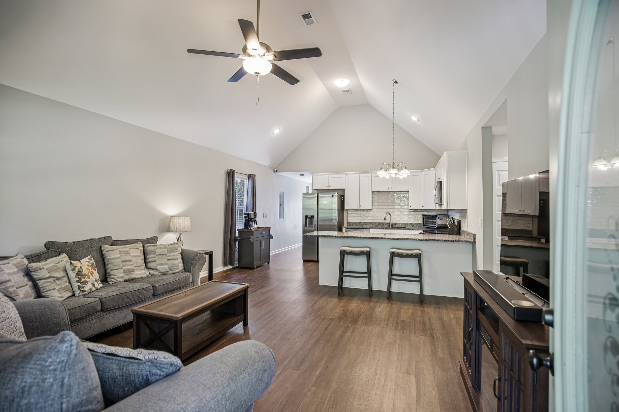 1122 Taylortown Road White Bluff, TN 37187 - Photo 9 of 56 a living room with stainless steel appliances kitchen island granite countertop furniture and a kitchen view