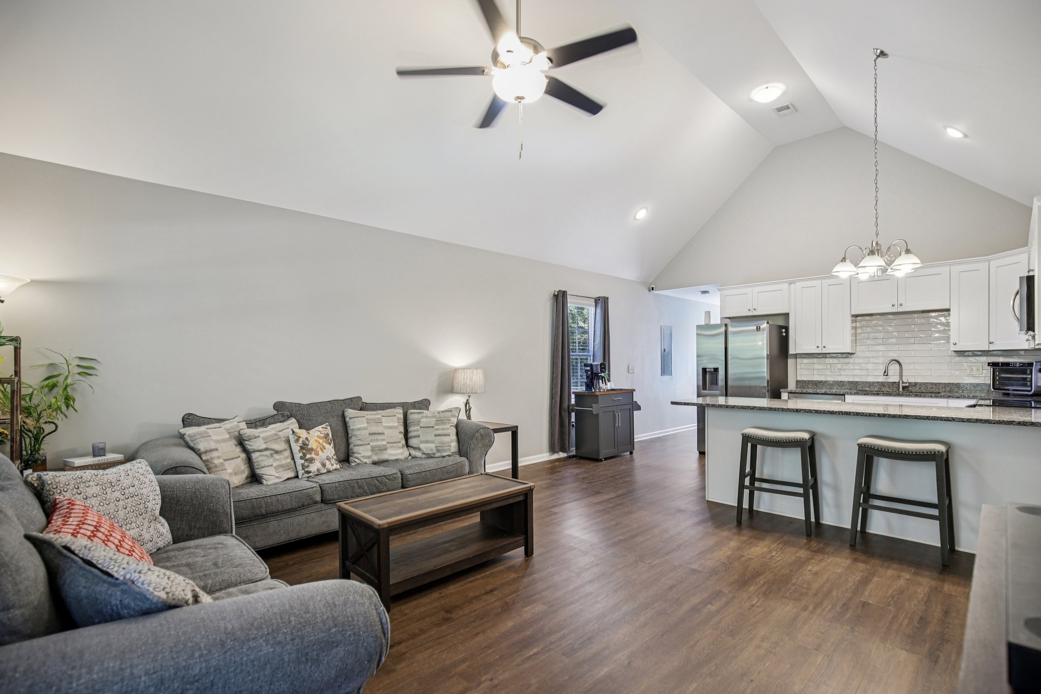 1122 Taylortown Road White Bluff, TN 37187 - Photo 10 of 56 a living room with furniture kitchen view and a wooden floor