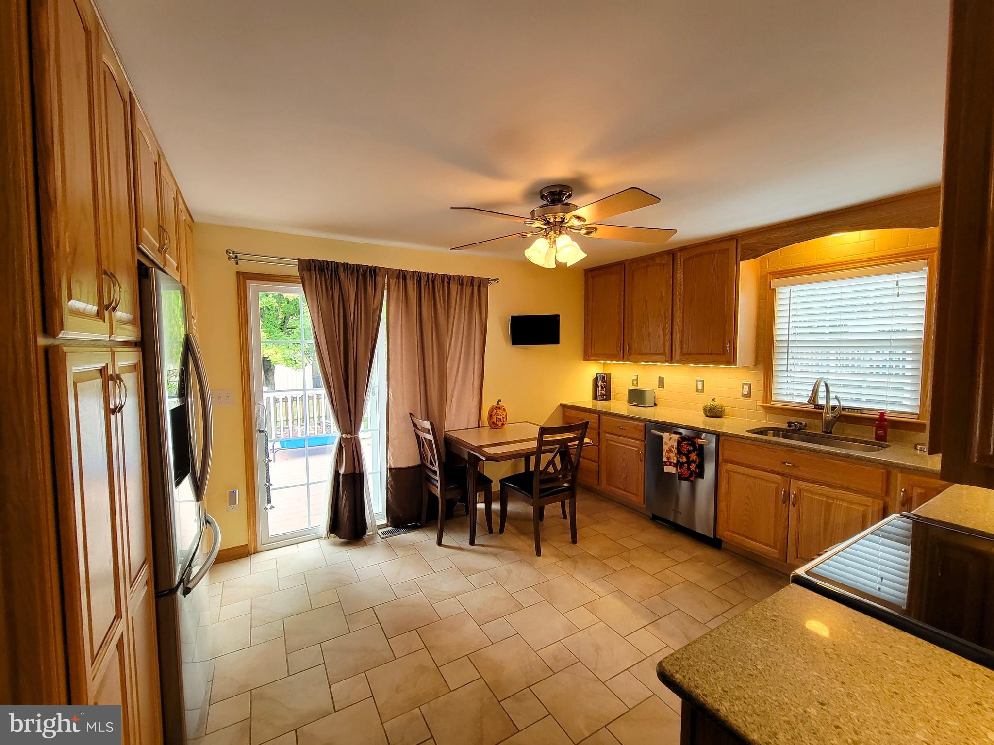 139 Mussetta Street Hanover, PA 17331 - Photo 11 of 58 a large kitchen with a table and chairs