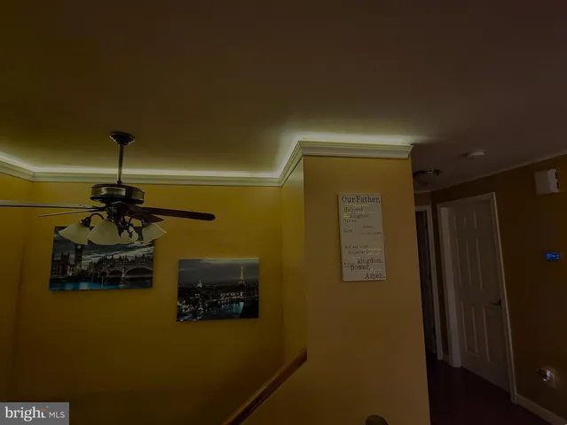 a kitchen with stainless steel appliances a stove sink microwave and cabinets