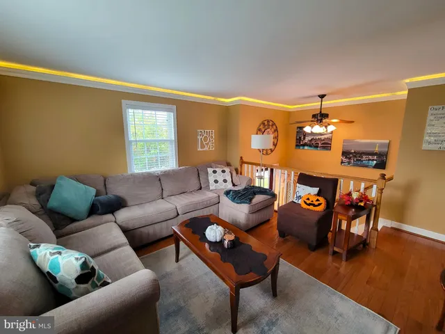 a metallic refrigerator freezer sitting in a kitchen