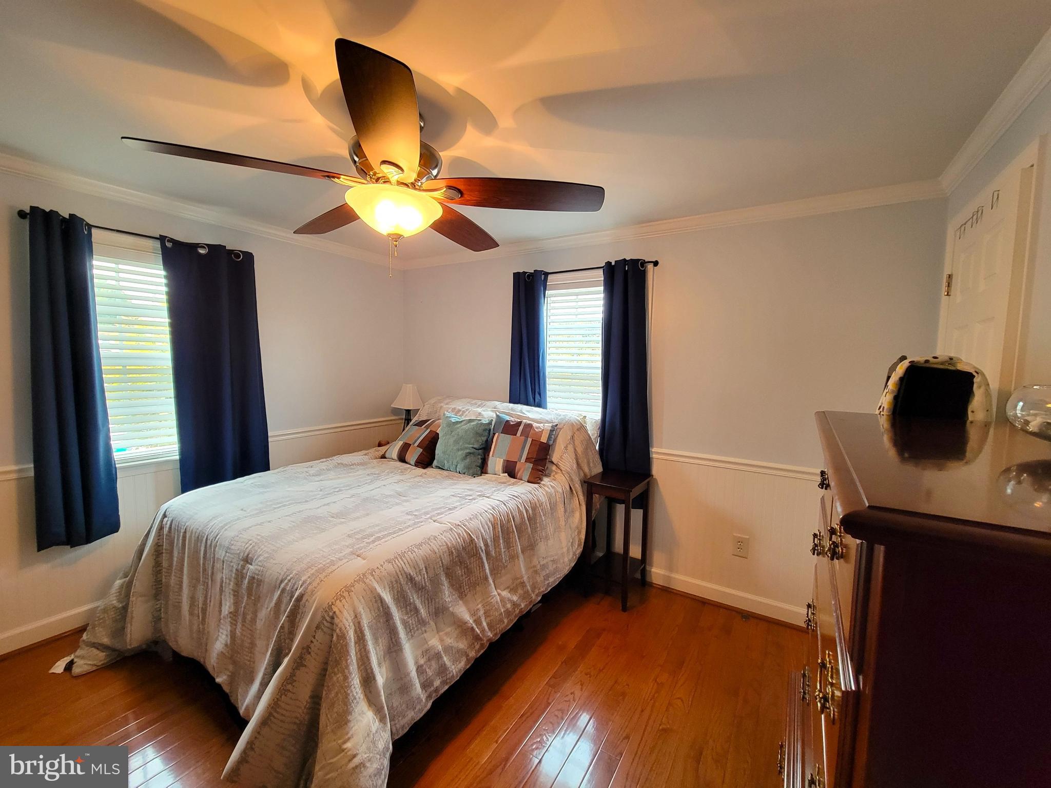 139 Mussetta Street Hanover, PA 17331 - Photo 14 of 58 a bedroom with a bed and a chandelier