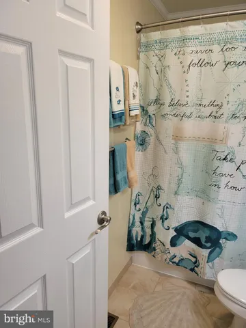 a painting on the wall next to a wall