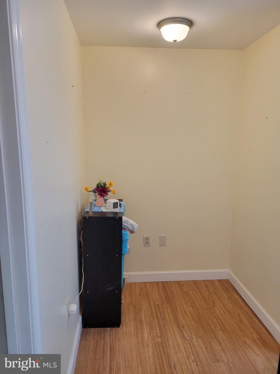 139 Mussetta Street Hanover, PA 17331 - Photo 53 of 58 a room with a walk in closet and wooden floor