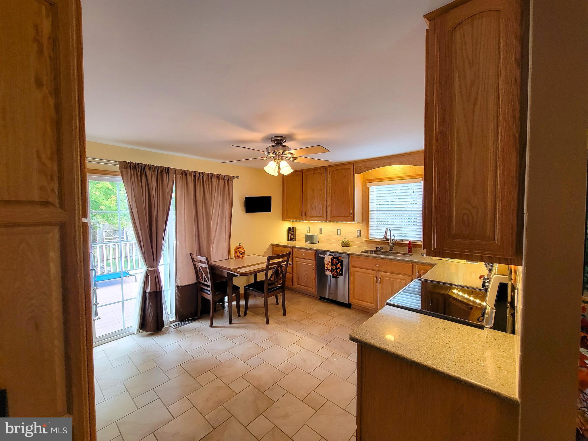 139 Mussetta Street Hanover, PA 17331 - Photo 10 of 58 a large kitchen with dining table and chairs