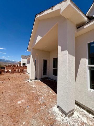 309 North 2805 West, Unit 407 Hurricane, UT 84737 - Photo 22 of 25 Covered patio primary bedroom access