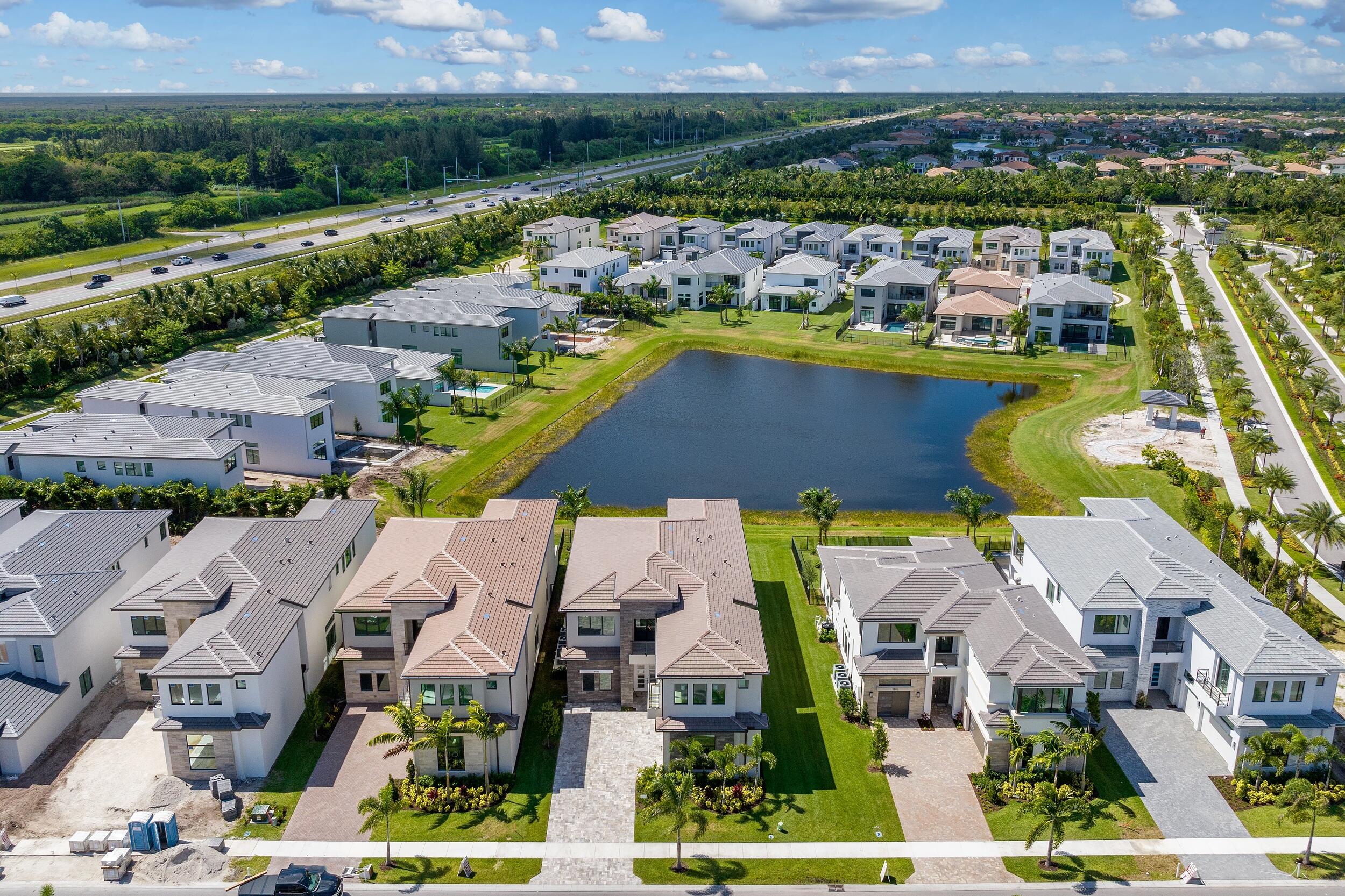 9893 Espresso Manor Boca Raton, FL 33496 - Photo 2 of 71 an aerial view of residential houses with outdoor space and swimming pool